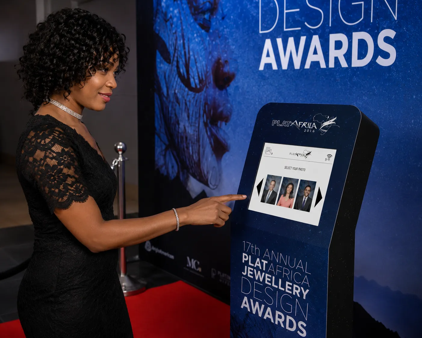 Guest Selecting Her Photo on the Branded, Illuminated Touchscreen Perspex Plinth