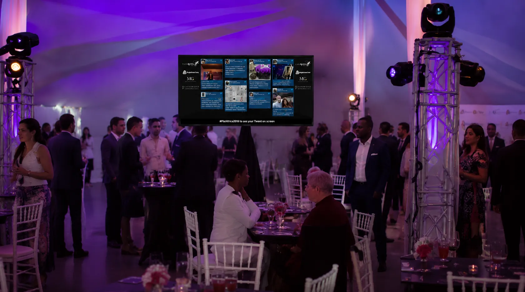 Tweet Screen Displaying Live, Moderated Guest Tweets Above the PlatAfrica Awards Venue Floor
